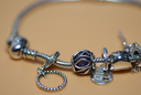 Pandora Bracelet 7.25"  7 Charms Strerling Silver - Love Theme cost