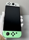 Nintendo Switch OLED Model HEG-001 Handheld Console 64GB cost