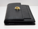 Gucci GG Morpheus Small Clutch in Black cost