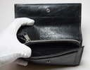 Gucci GG Morpheus Small Clutch in Black at best price