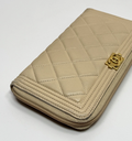 Chanel Boy Zip Around Wallet Lambskin Quilted Leather cost