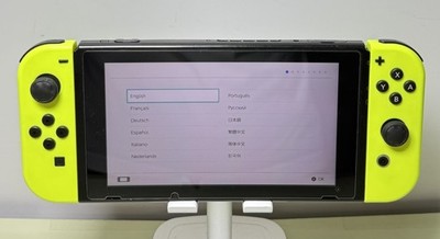 Nintendo Switch Neon Yellow Bundle w/ 4 Games + Mario Odyssey Case & Charger #1