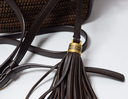 Saint Laurent Woven Raffia Camera Bag with a Tassle at best price