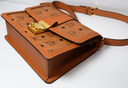 MCM Signature Visetos Tracy Shoulder Bag In Cognac cost