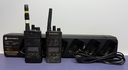 [10799-1] 2x Motorola RMU2080D Radios + PMLN6387A Charger – Tested, Works, Worn