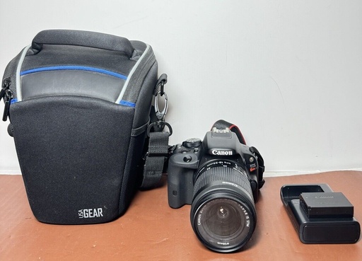 [7015-1] Canon EOS Rebel SL1 18MP Digital SLR Camera W 18-55 Lens, battery, charger