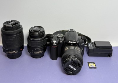 [10364-1] Nikon D3000 DSLR Camera Bundle - 3 Lenses, Bag, Charger, 1394 shutter count