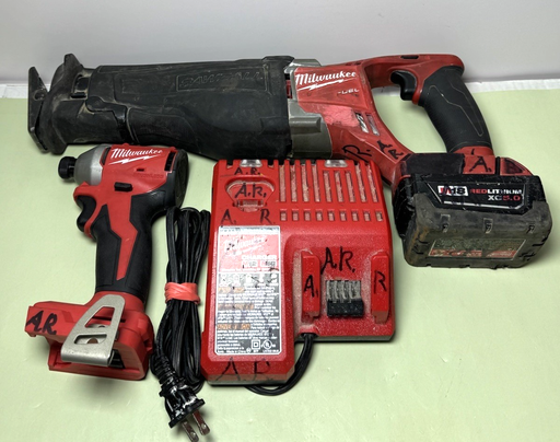 [9539-1, 9539-4] Milwaukee 3650-20 M18 18V 1/4" Driver + 2720-20 M18 Saw w 5.0 Ah batt+ charger